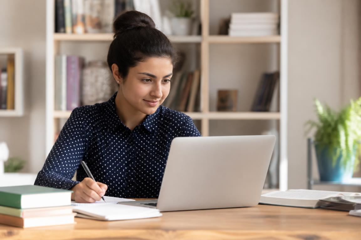 A student using a laptop to access Steady Student resources